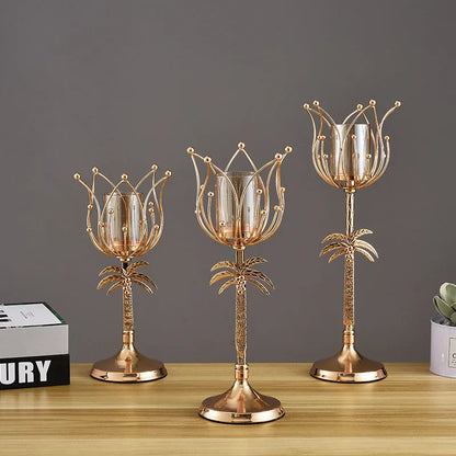 Iron candle holder in gold or silver finish on a dining table.