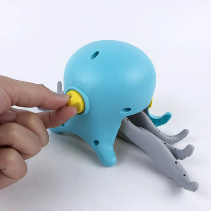 Floating octopus toy in purple and blue with six-leg linkage design for bath and beach fun