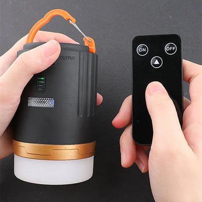 Black remote control emergency camping light with LED illumination and ABS plastic housing.