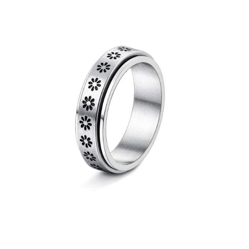 Rotatable stainless steel spinner ring with moon and star designs for anxiety relief and style