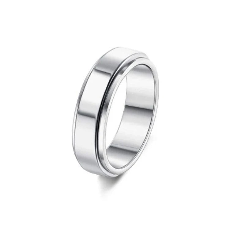 Rotatable stainless steel spinner ring with moon and star designs for anxiety relief and style