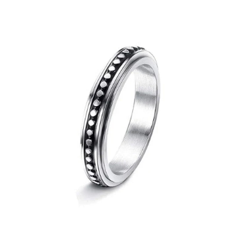 Rotatable stainless steel spinner ring with moon and star designs for anxiety relief and style