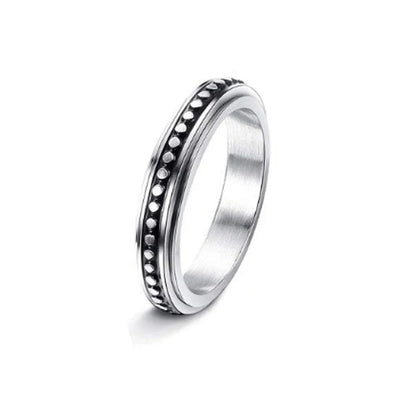 Rotatable stainless steel spinner ring with moon and star designs for anxiety relief and style