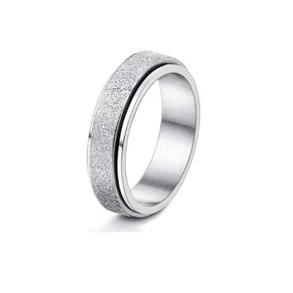 Rotatable stainless steel spinner ring with moon and star designs for anxiety relief and style