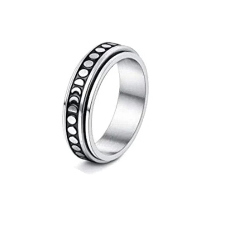Rotatable stainless steel spinner ring with moon and star designs for anxiety relief and style
