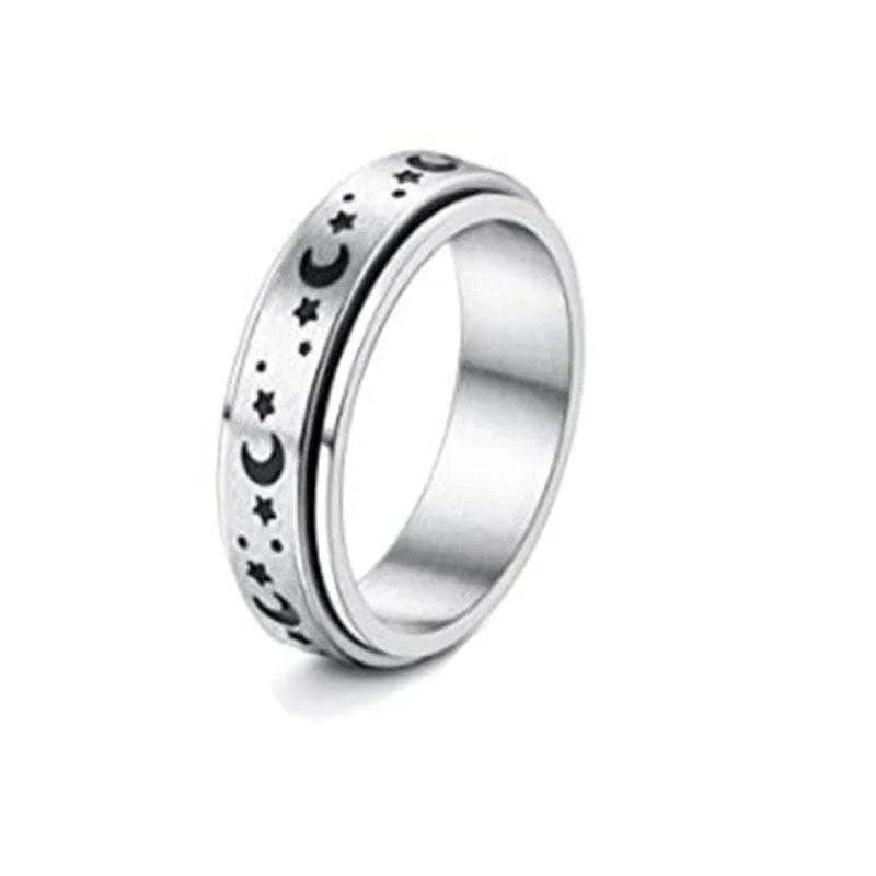 Rotatable stainless steel spinner ring with moon and star designs for anxiety relief and style