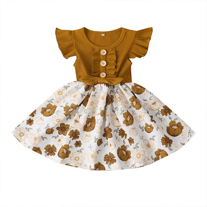 Sleeveless summer dress for toddler girl on a hanger, shown in one of six available colours.