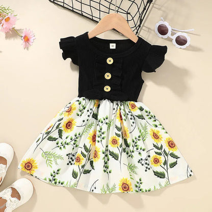Sleeveless summer dress for toddler girl on a hanger, shown in one of six available colours.