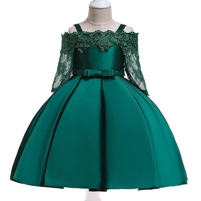 Simple children's polyester dress with lace trim in dark red, shown on a hanger.