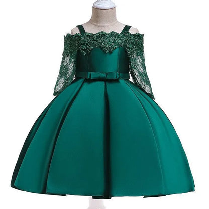 Simple children's polyester dress with lace trim in dark red, shown on a hanger.