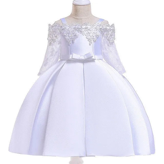 Simple children's polyester dress with lace trim in dark red, shown on a hanger.