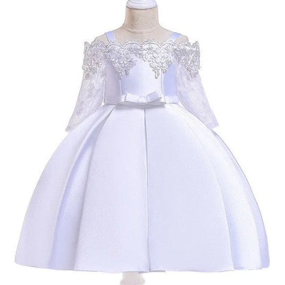Simple children's polyester dress with lace trim in dark red, shown on a hanger.
