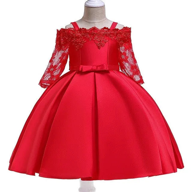 Simple children's polyester dress with lace trim in dark red, shown on a hanger.