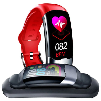 Black smart fitness watch on wrist showing digital display, with heart rate and waterproof features.