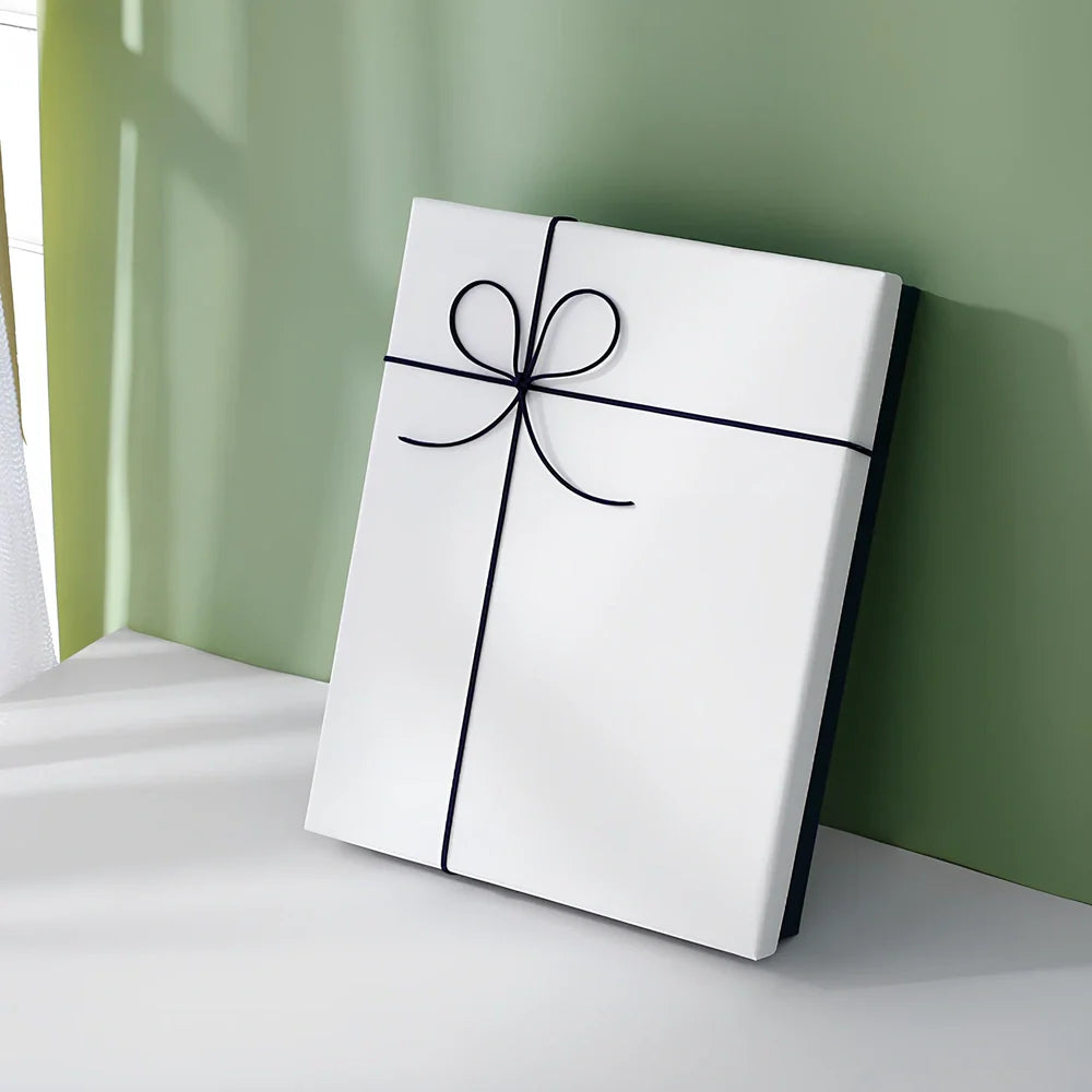 Rectangular gift box showing thick cardboard construction with special paper covering in blue and white colour combination