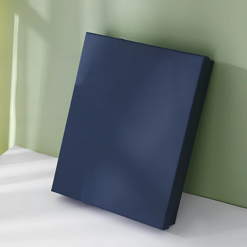 Rectangular gift box showing thick cardboard construction with special paper covering in blue and white colour combination