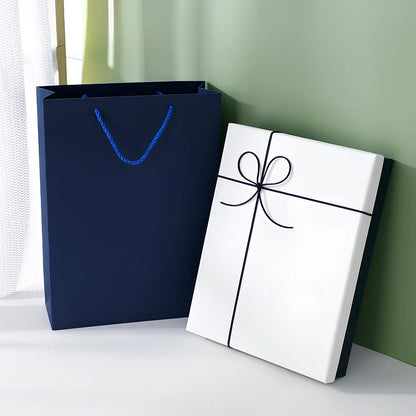 Rectangular gift box showing thick cardboard construction with special paper covering in blue and white colour combination
