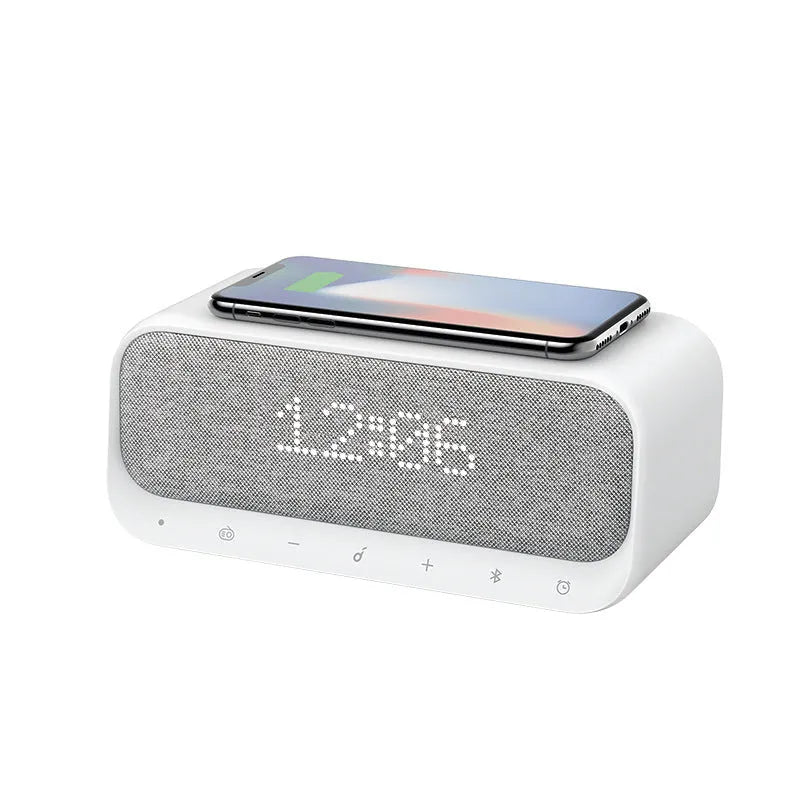 Anker Soundcore white Bluetooth speaker with wireless charging surface and display screen