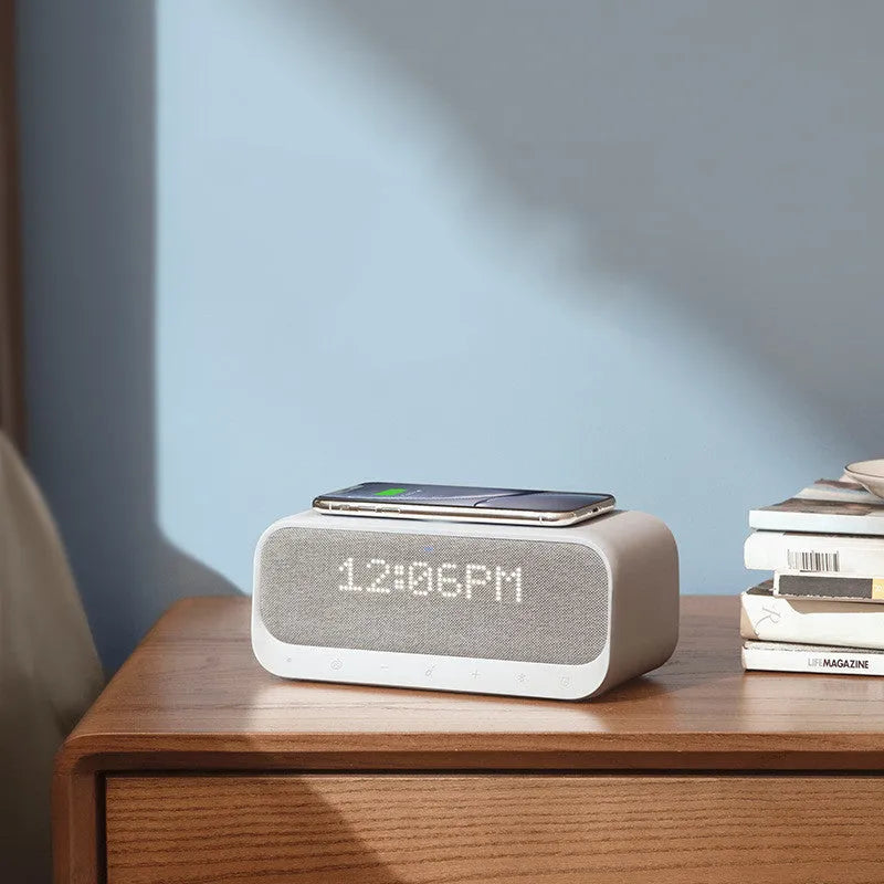 Anker Soundcore white Bluetooth speaker with wireless charging surface and display screen