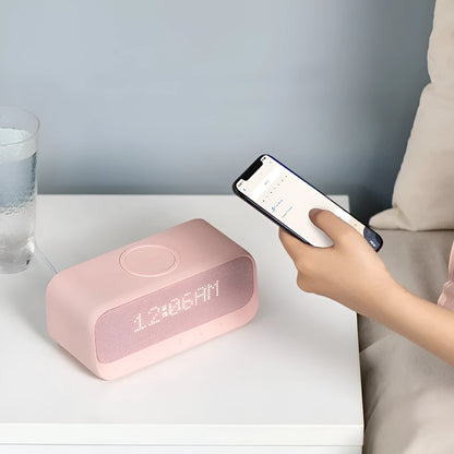 Anker Soundcore white Bluetooth speaker with wireless charging surface and display screen
