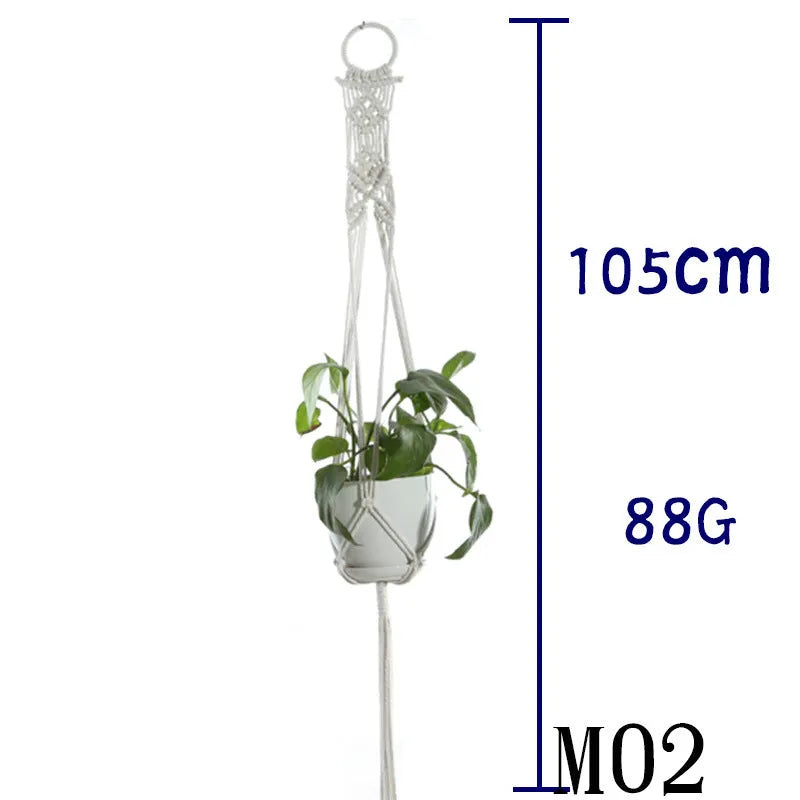 Handmade beige cotton rope net bag holding a plant pot, showing its textured sling design.