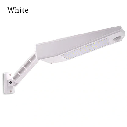 Adjustable solar light with motion sensor showing black or white colour options