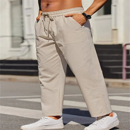 Men's straight-leg linen trousers with an elastic waist in a solid colour