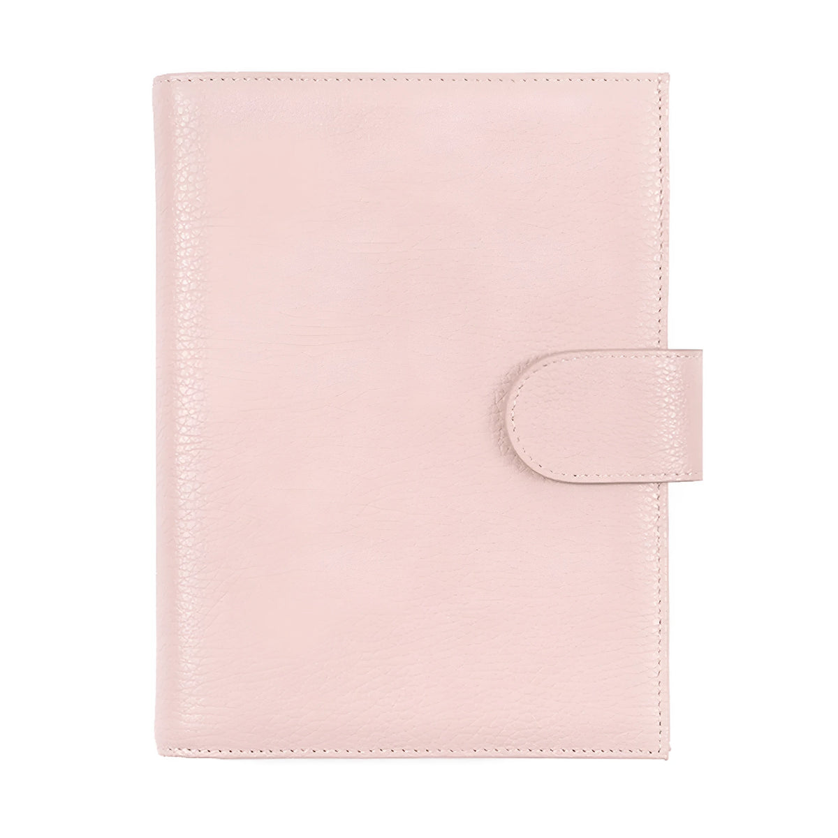 Close-up of a hand-embossed lychee pattern on an off-white A6 cowhide leather notebook with loose-leaf binding.