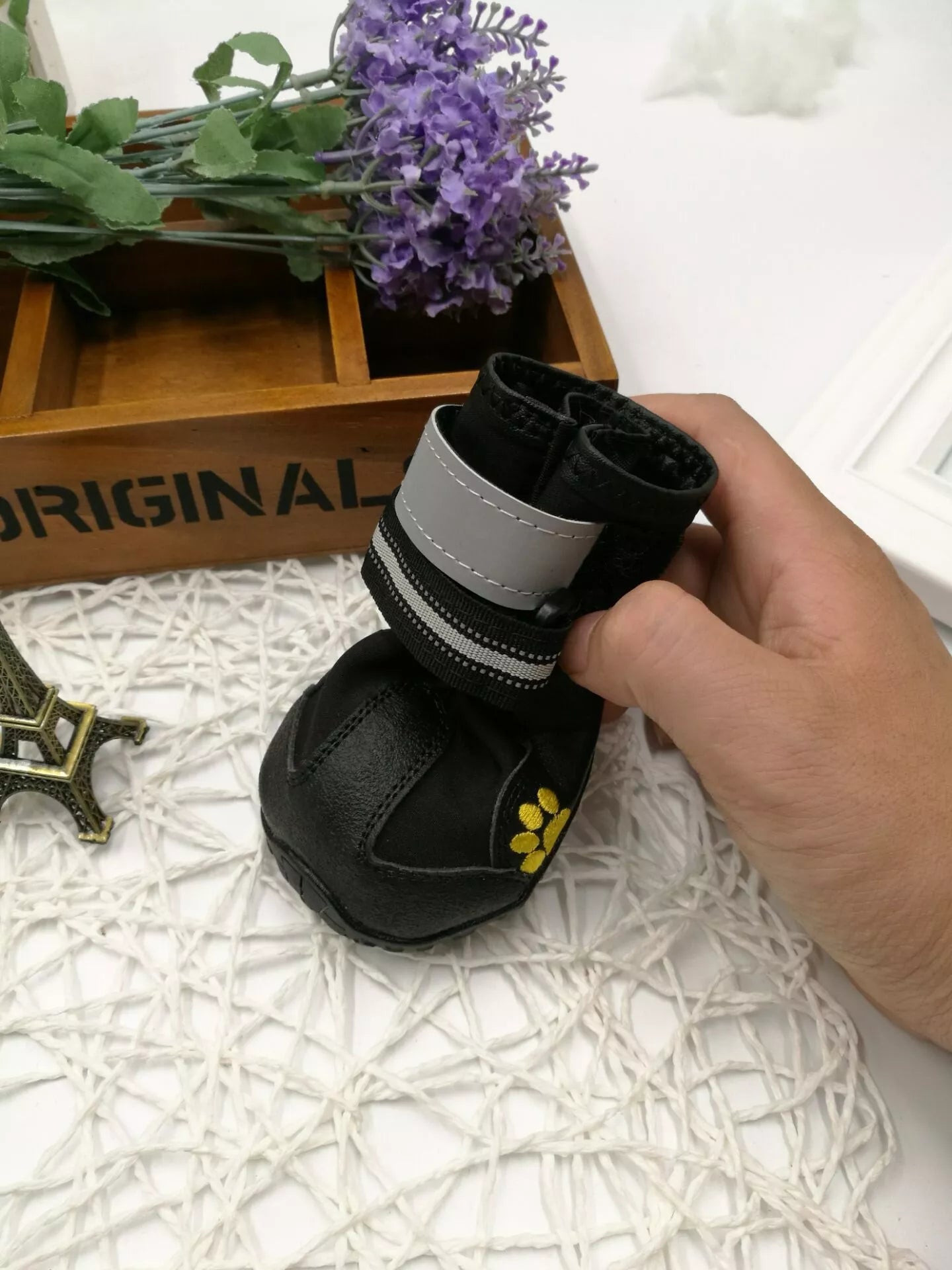 Black waterproof dog shoes with non-slip soles and adjustable fuzzy belt