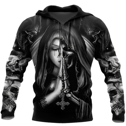 A black hooded sweatshirt with a large white and grey 3D printed skull graphic on the front, featuring long sleeves and a drawstring hood.
