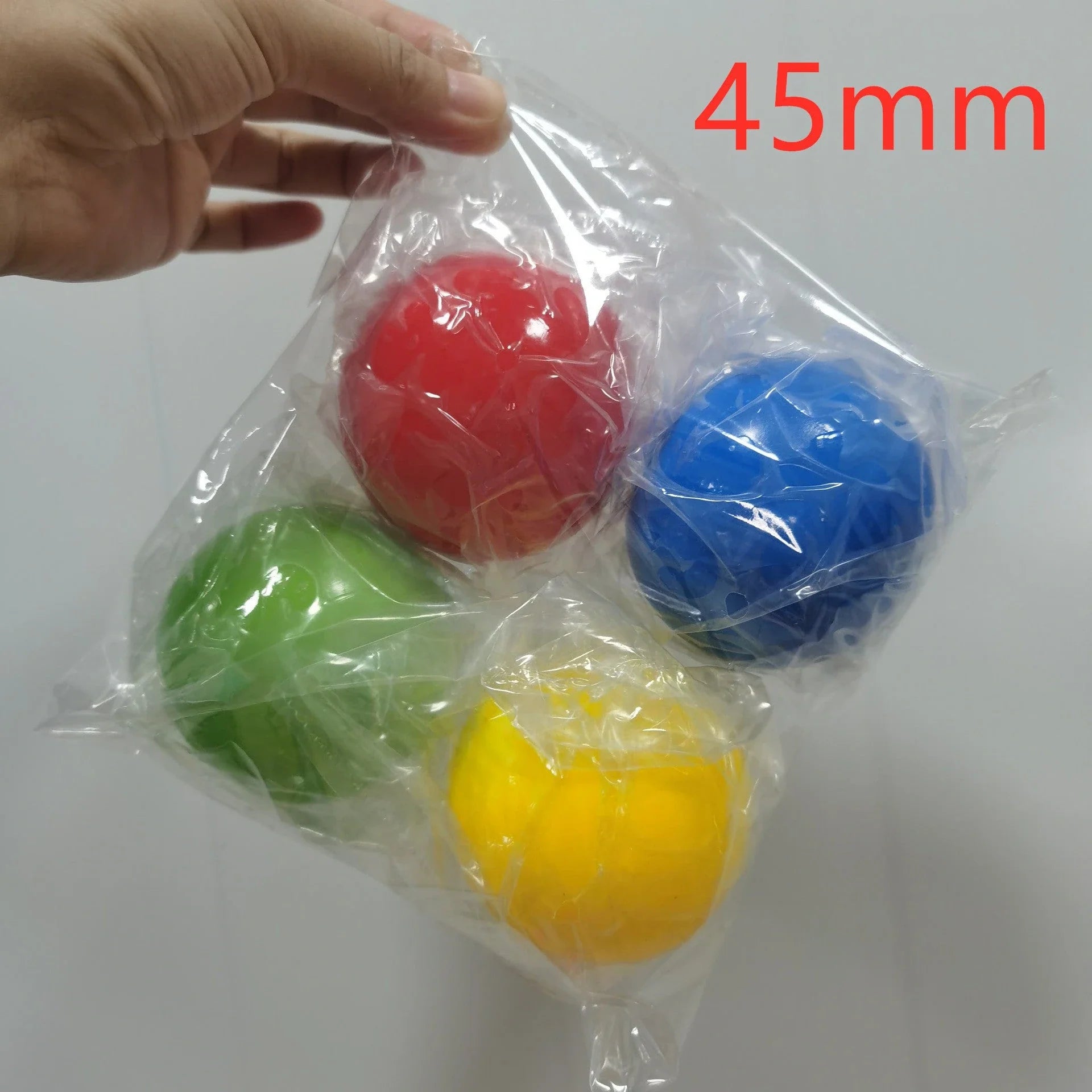 Colorful, luminous stress relief balls with a sticky surface for bouncing, squeezing, and sticking to surfaces