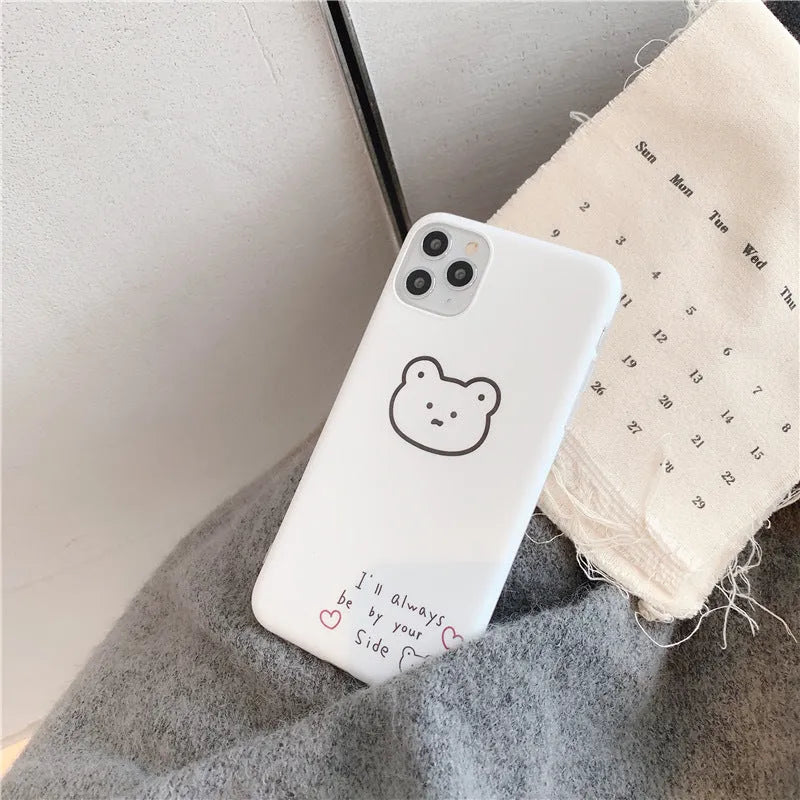 Silicone iPhone case with a Korean cartoon bear design on the back.