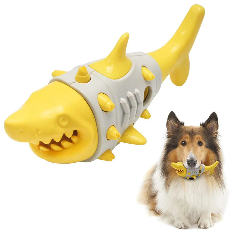 Blue, grey, and yellow plastic dog teething toy with shark-tooth texture and venting holes.
