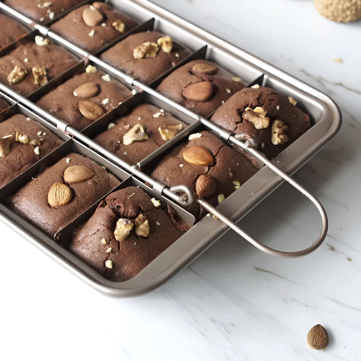 Silver checkered brownie baking pan with square moulds on high carbon steel
