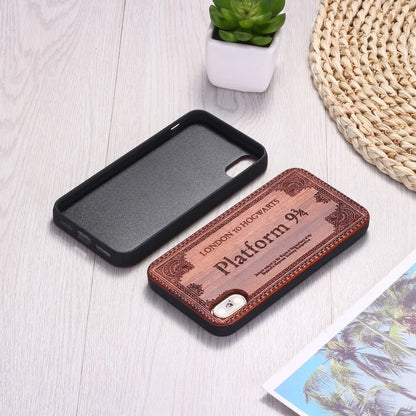 Wooden iPhone case with laser-carved floral design and flexible TPU bumper in natural wood finish.