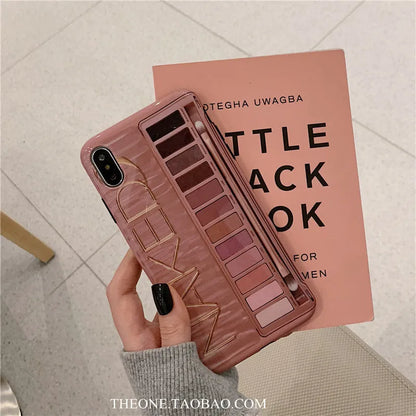 Silicone eye shadow phone case for iPhone showing flesh and grey colour options with precise port cutouts