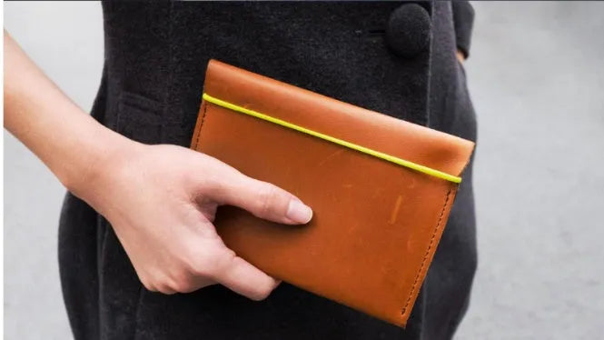 Portable open-design silicone card holder in yellow powder colour showing internal card slots