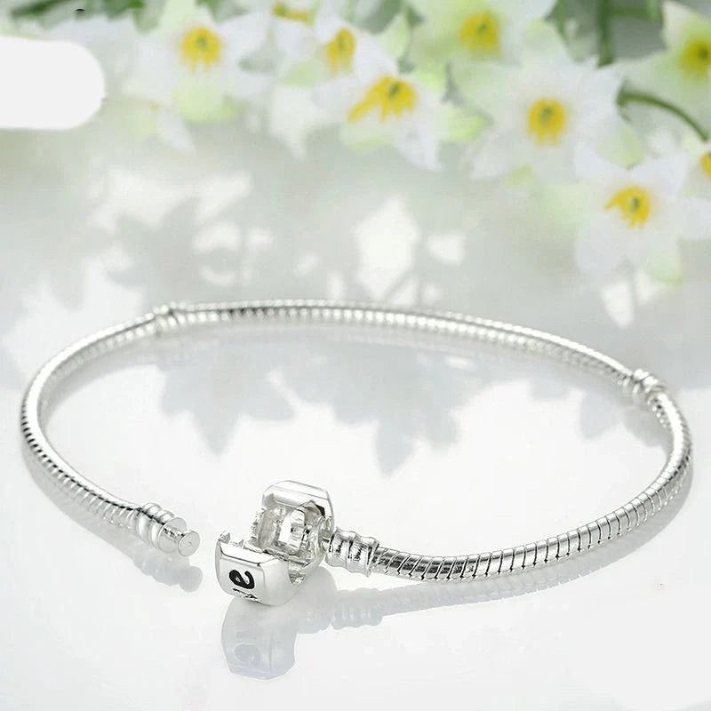 Elegant silver-plated beaded bracelet with a modern, sophisticated design