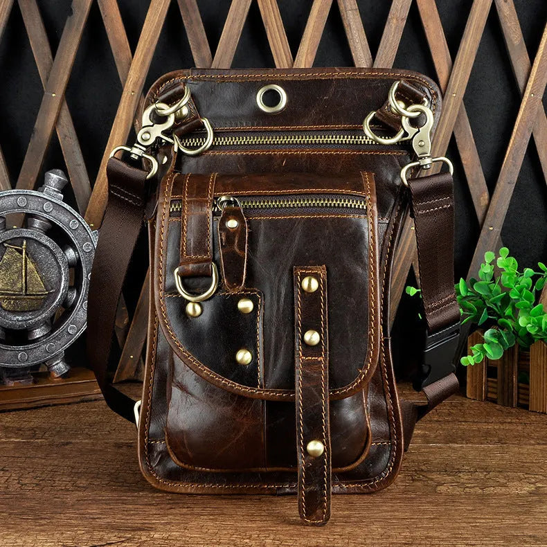Men's black genuine cowhide leather fanny pack with zipper open showing internal phone and ID compartments