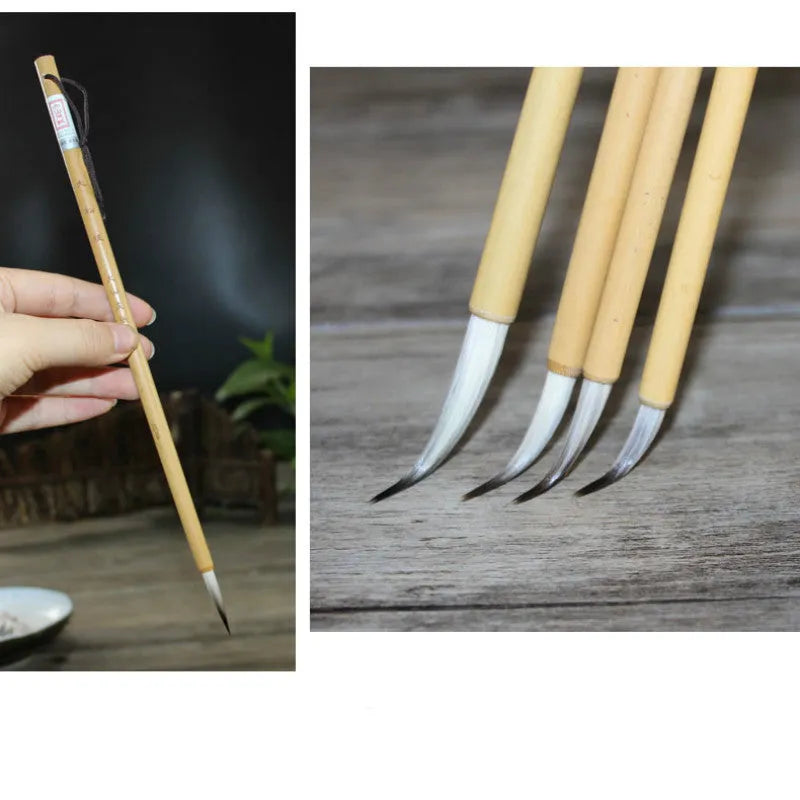 Four traditional writing brushes with gold bodies, wolf wool hair, and pine branch colour