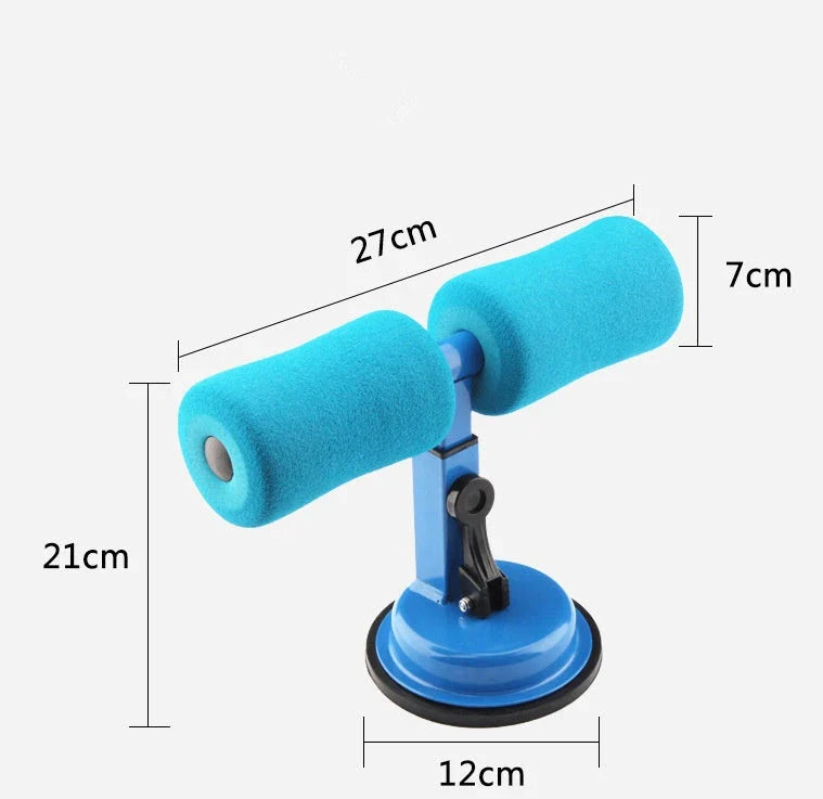 Compact sit-up strength trainer with steel springs and foam padding for home fitness