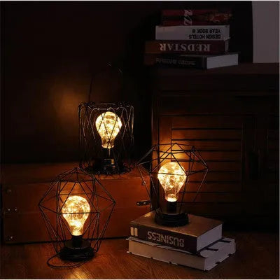Minimalist wrought iron table lamp shaped like wine bottle with warm white LED light