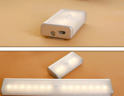 Wireless LED wardrobe light in 300mm size with motion sensor and charging pad, warm white glow, mounted on shelf