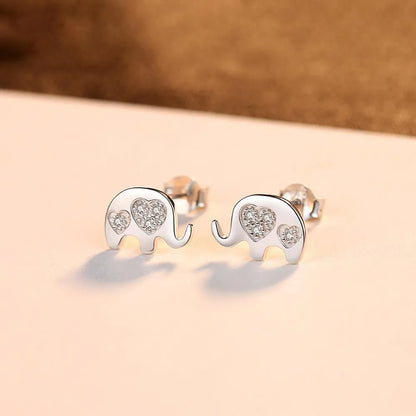Silver geometric drop earrings measuring 0.6cm by 0.9cm with gem setting detailing
