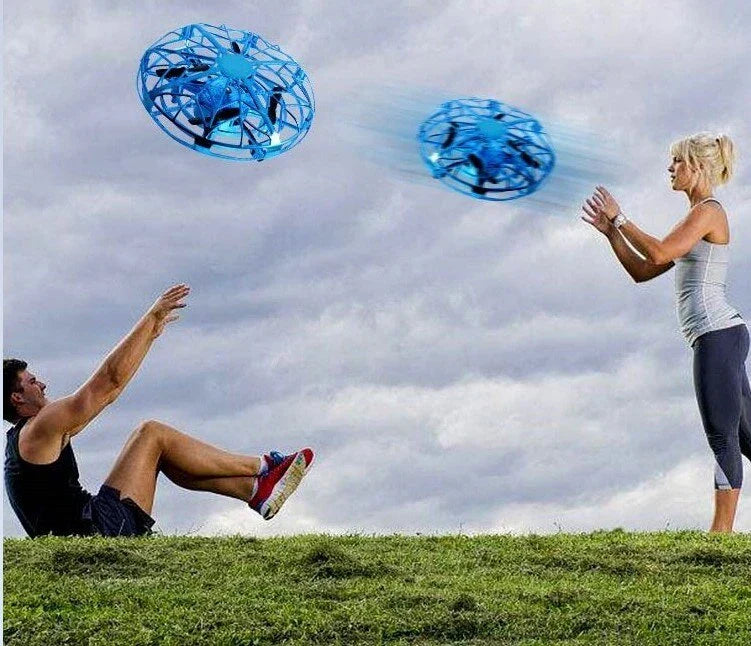 Futuristic mini drone helicopter with UFO-inspired design, automatic obstacle detection, and intuitive controls