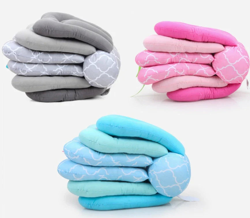 Adjustable breastfeeding pillow with soft, plush fill and rectangular shape for comfortable nursing