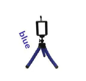 Mini flexible octopus tripod stand with sponge grip holding a smartphone.