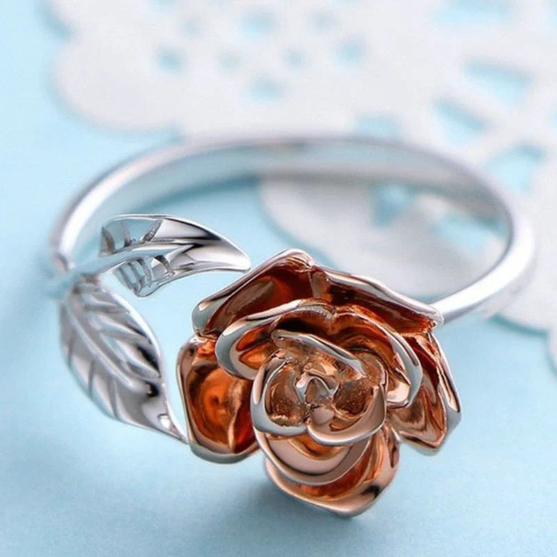 Rose gold adjustable ring with sparkling zirconia stones, showcasing a delicate and sophisticated design