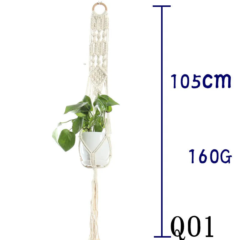 Handmade beige cotton rope net bag holding a plant pot, showing its textured sling design.