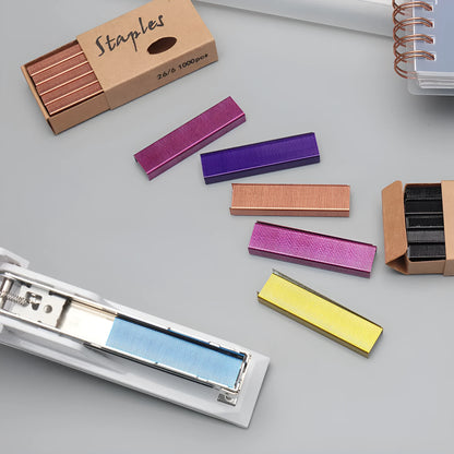 Box of 1000 metal stapling needles in rose gold, black, purple, and rose red colours.